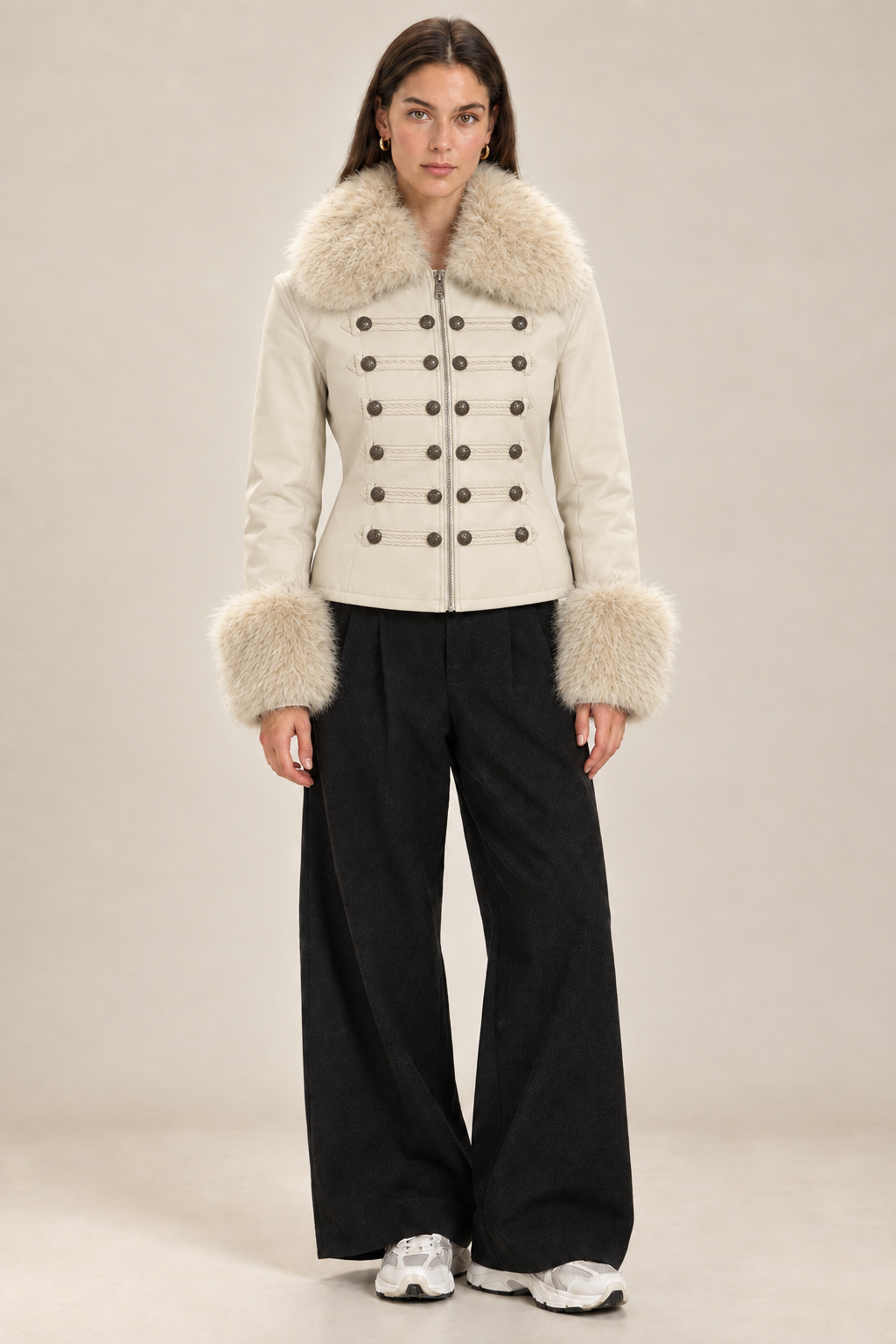 Brunette model wearing the cream military-style fur-trim jacket in the same studio