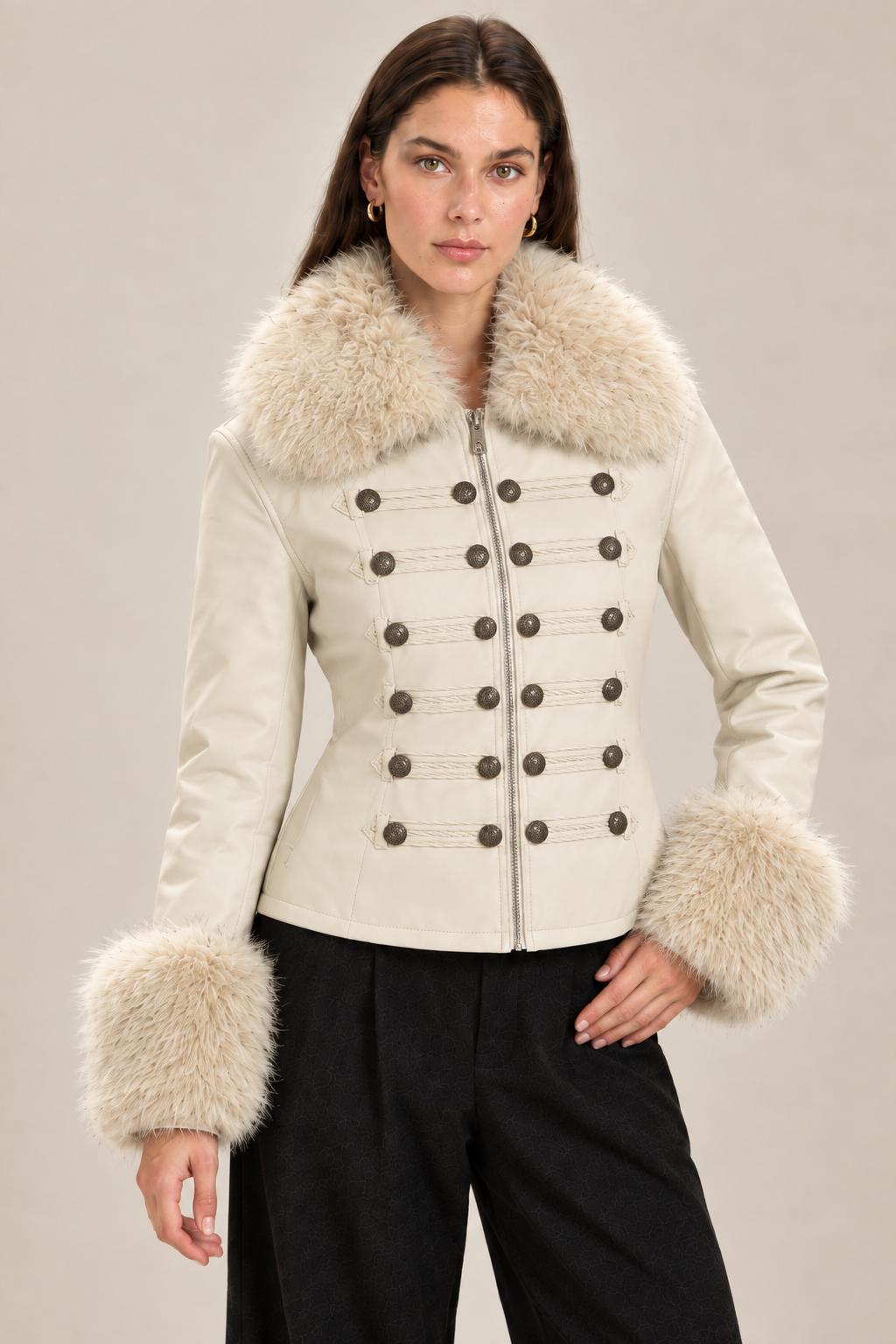 Close-up of the cream military-style jacket with the model in a new pose