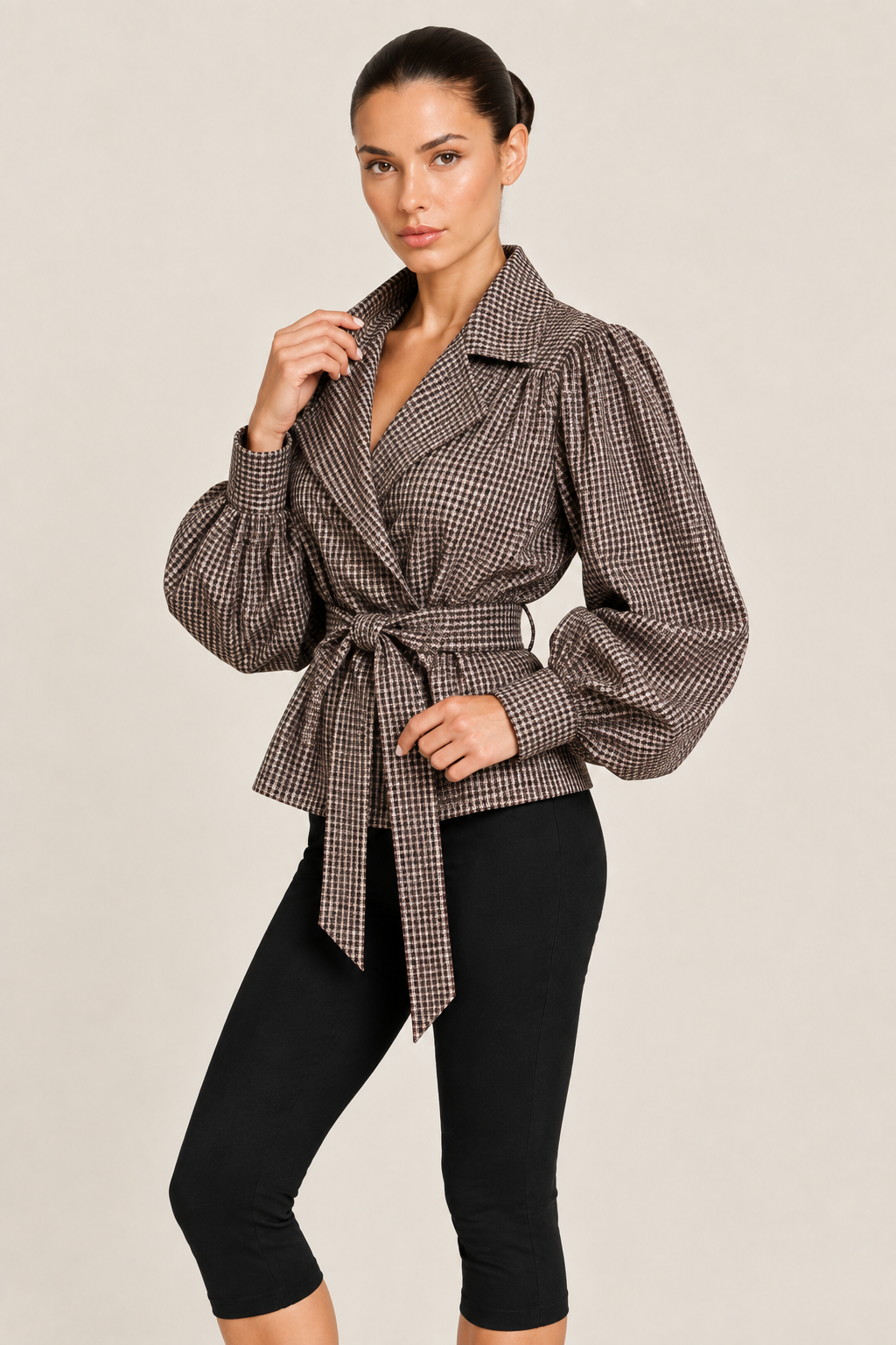 Close-up studio image of the check jacket