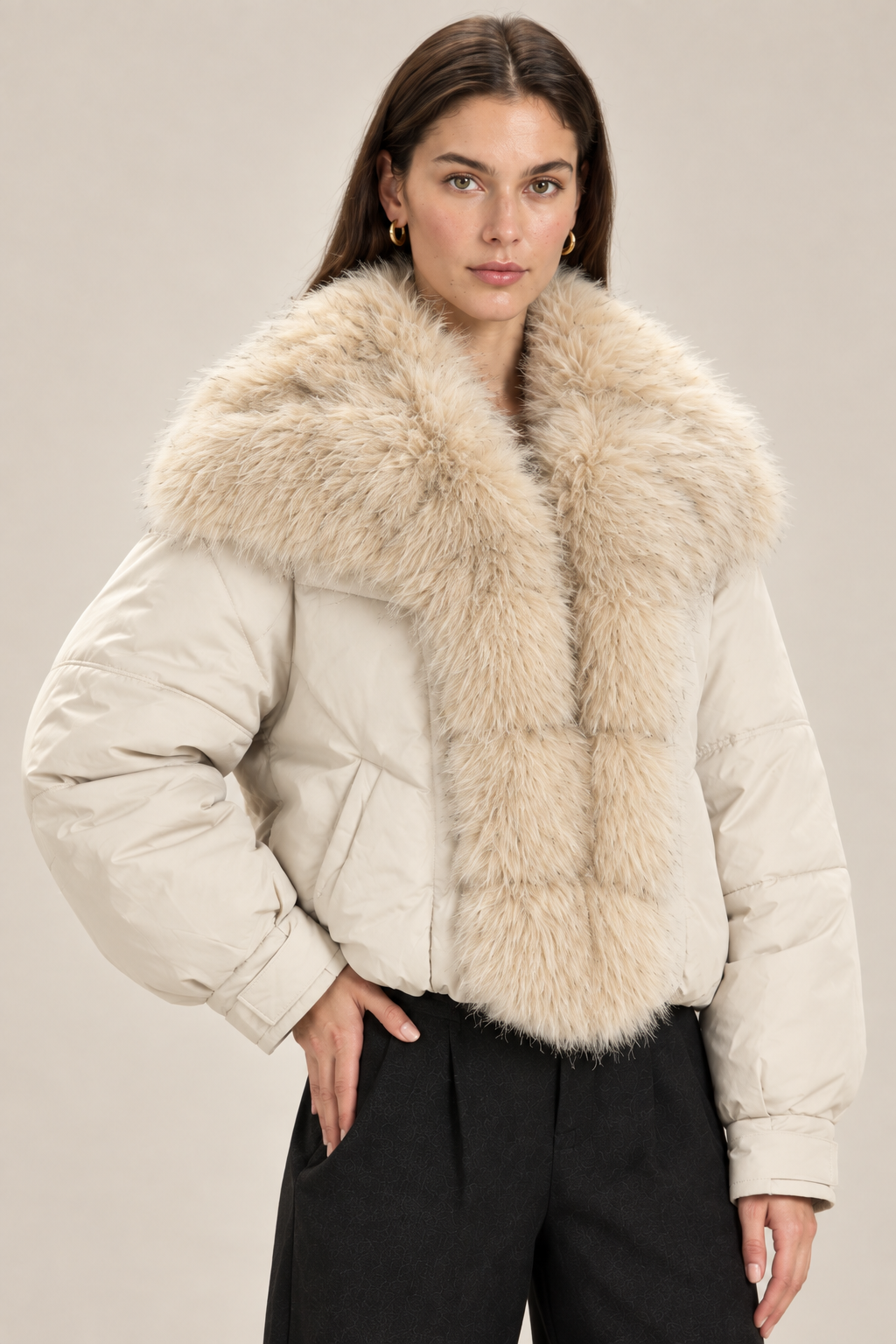 Cream jacket close-up with the brunette model in a fresh pose