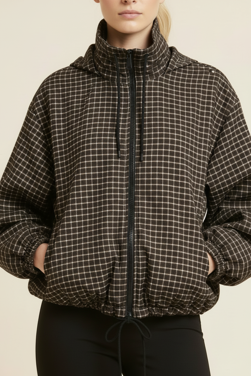 Front-facing close-up of the checked jacket